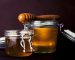 Pure Sidr honey in a glass jar with a wooden honey dipper – rich in nutrients and health benefits.